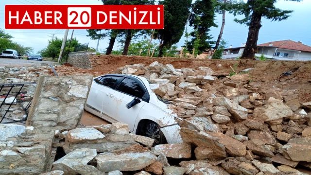 İnşaat halindeki okulun istinat duvarı aracın üzerine çöktü