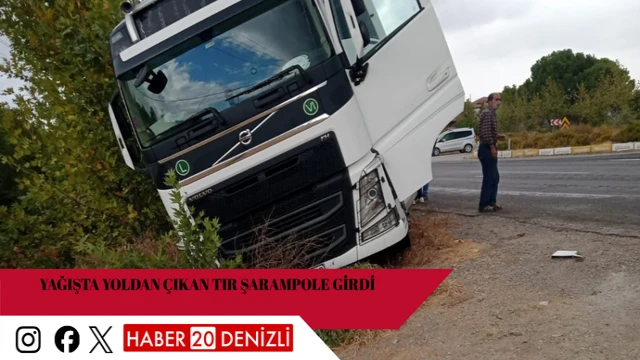 Yağışta yoldan çıkan tır şarampole girdi