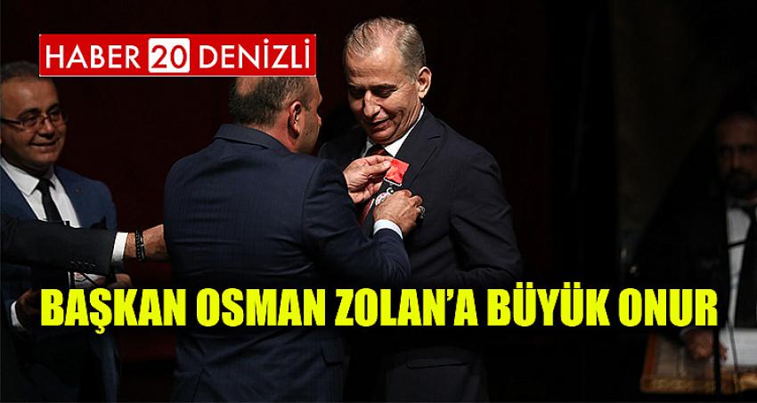 BAŞKAN OSMAN ZOLAN’A BÜYÜK ONUR