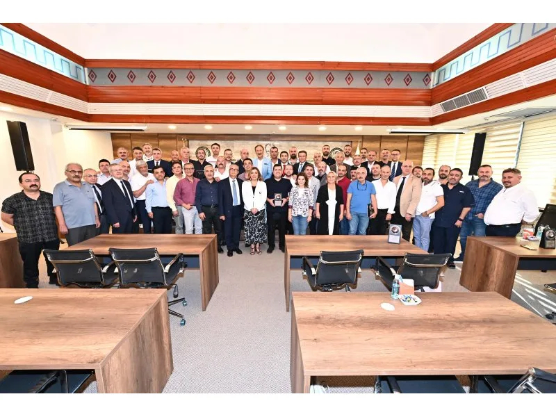 DTO meclis üyelerine plaket