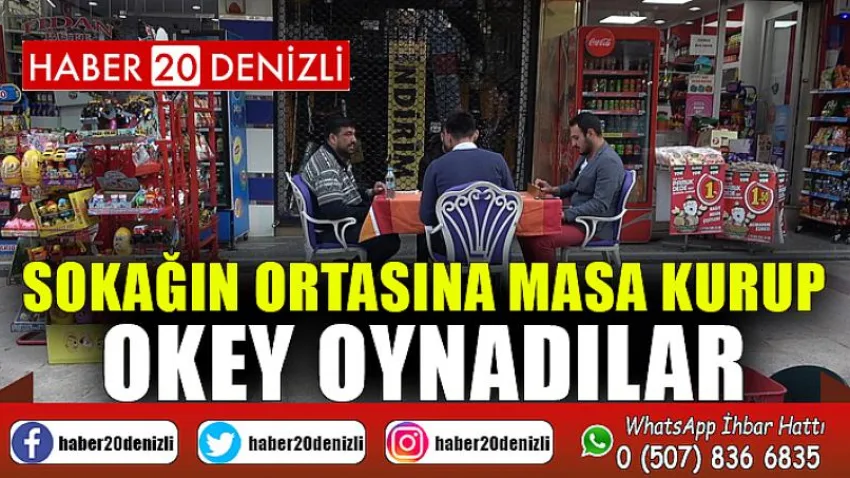 Sokağın ortasına masa kurup okey oynadılar