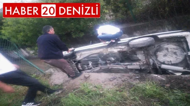 Aracıyla birlikte kanala uçan sürücüyü itfaiye kurtardı