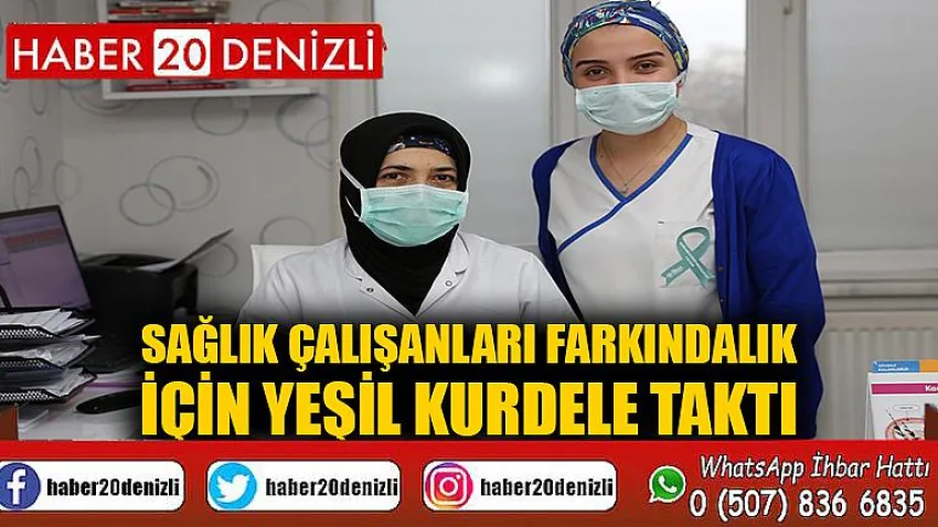 Sağlık çalışanları farkındalık için yeşil kurdele taktı
