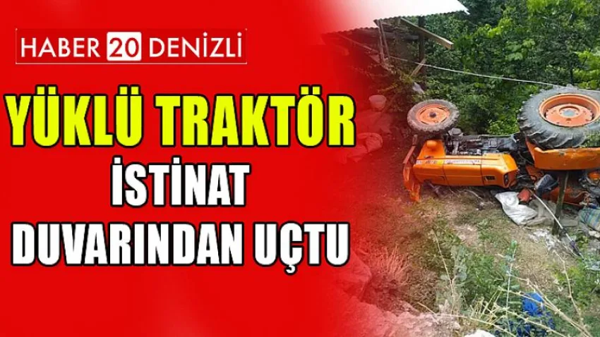Yüklü traktör istinat duvarından uçtu