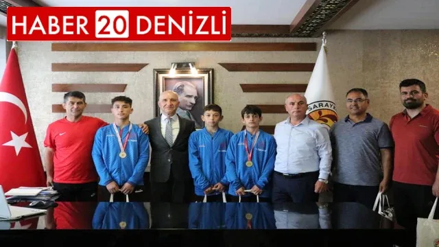 Ödülleri toplayan Sarayköylü güreşçilerden Başkan Özbaş’a ziyaret