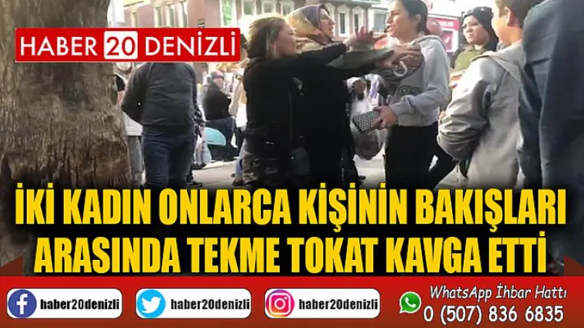 İki kadın onlarca kişinin bakışları arasında tekme tokat kavga etti