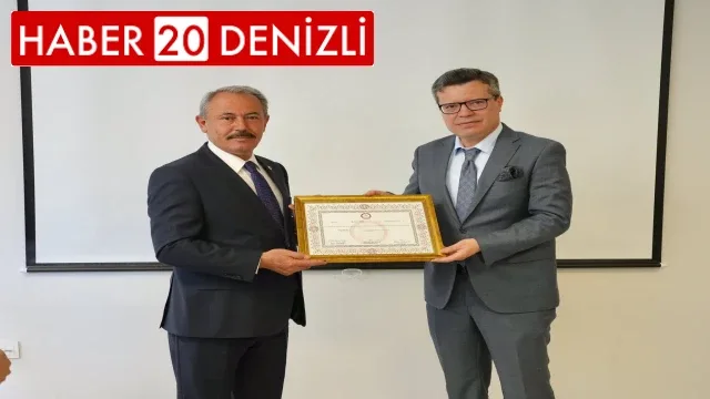 28'inci dönem Denizli milletvekili Şahin TİN Mazbatayı aldı.