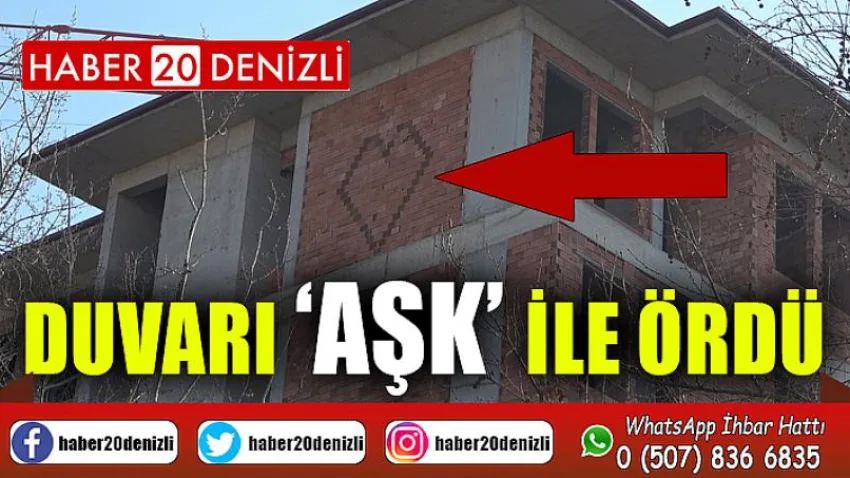 Duvarı ‘aşk’ ile ördü
