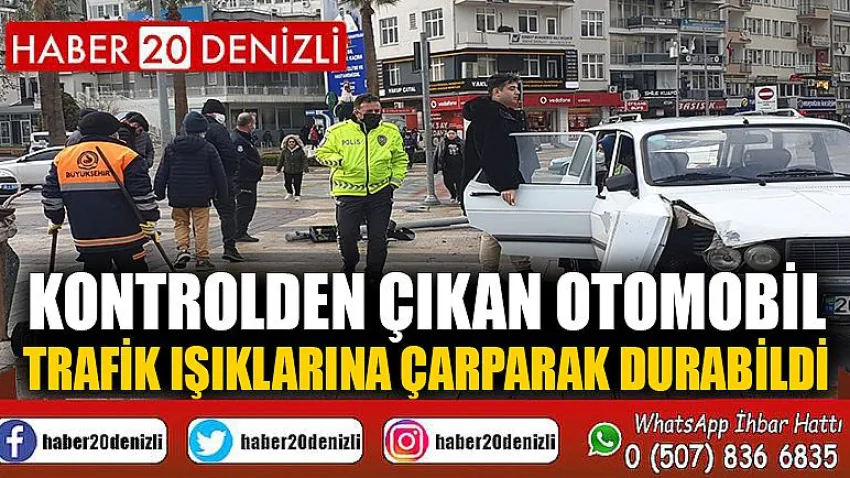 Kontrolden çıkan otomobil trafik ışıklarına çarparak durabildi