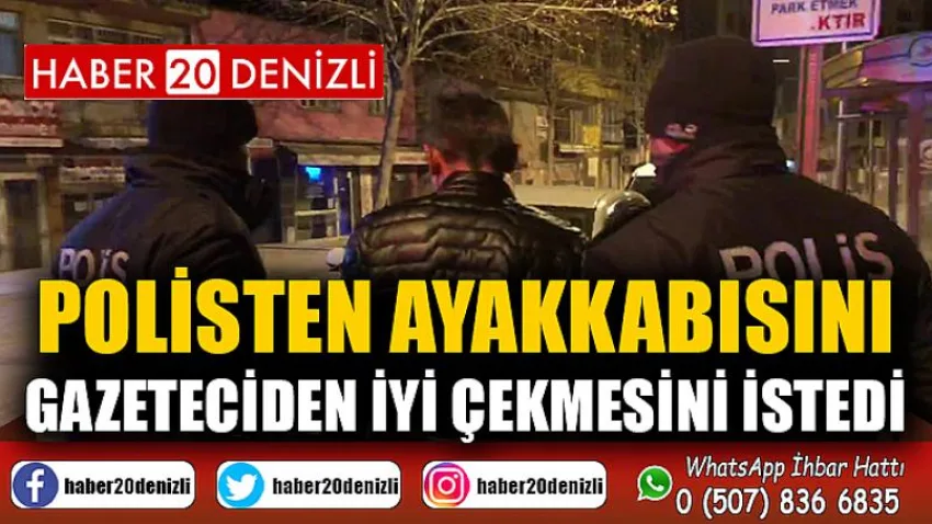 Polisten ayakkabısını, gazeteciden iyi çekmesini istedi